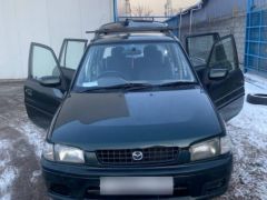 Photo of the vehicle Mazda Demio