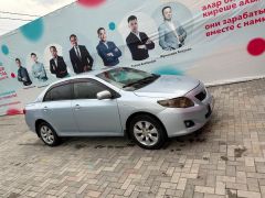 Сүрөт унаа Toyota Corolla