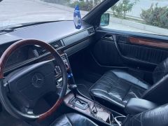 Сүрөт унаа Mercedes-Benz W124