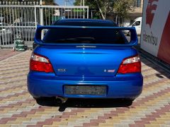 Photo of the vehicle Subaru Impreza WRX STi