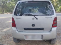 Photo of the vehicle Suzuki Wagon R+