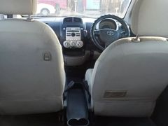 Сүрөт унаа Toyota Passo