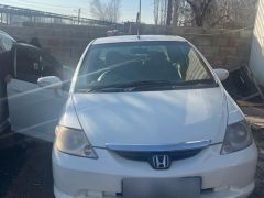 Photo of the vehicle Honda Fit Aria