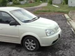 Сүрөт унаа Kia Carens