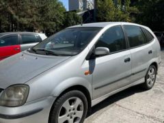 Фото авто Nissan Almera Tino