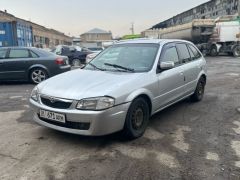 Фото авто Mazda 323