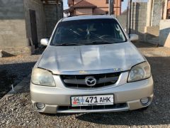 Photo of the vehicle Mazda Tribute