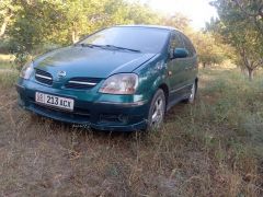 Фото авто Nissan Almera Tino