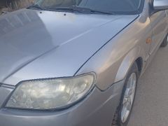 Сүрөт унаа Mazda 323