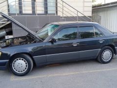 Фото авто Mercedes-Benz W124