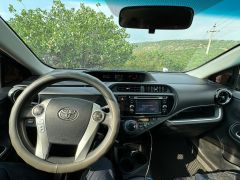 Фото авто Toyota Prius c