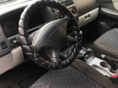 Сүрөт унаа Mitsubishi Montero Sport