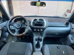 Сүрөт унаа Toyota RAV4