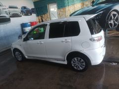 Photo of the vehicle Mazda Demio