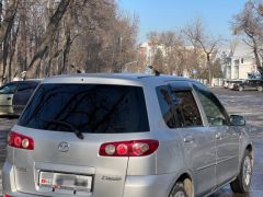 Сүрөт унаа Mazda Demio