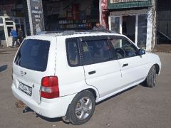 Сүрөт унаа Mazda Demio