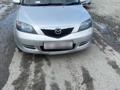 Фото авто Mazda Demio