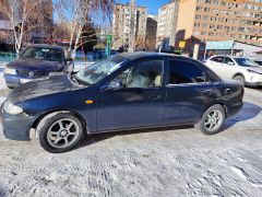 Photo of the vehicle Mazda 323