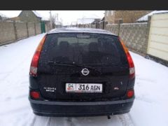 Фото авто Nissan Almera Tino