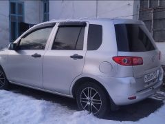 Photo of the vehicle Mazda Demio