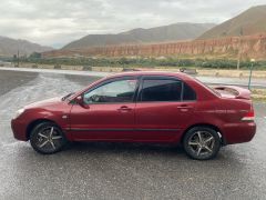 Фото авто Mitsubishi Lancer