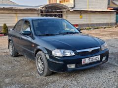 Photo of the vehicle Mazda 323