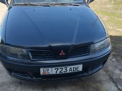 Фото авто Mitsubishi Carisma