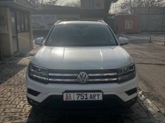 Фото авто Volkswagen Tharu