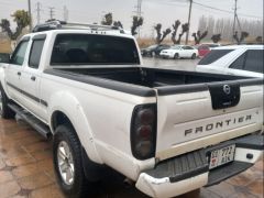 Фото авто Nissan Navara (Frontier)