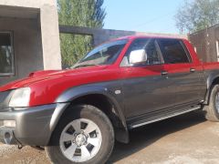 Фото авто Mitsubishi L200