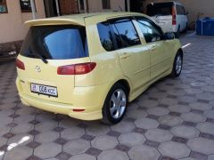 Сүрөт унаа Mazda Demio