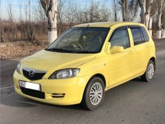 Photo of the vehicle Mazda Demio