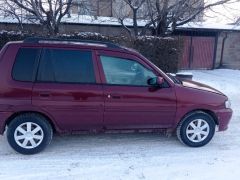 Photo of the vehicle Mazda Demio