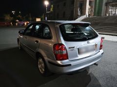 Фото авто Mazda 323