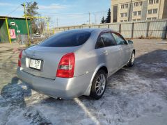 Фото авто Nissan Primera