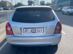 Фото авто Mazda 323