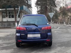 Сүрөт унаа Mazda Demio