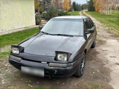 Сүрөт унаа Mazda 323