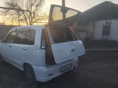 Сүрөт унаа Nissan Cube