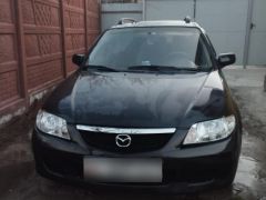 Фото авто Mazda 323