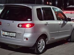 Photo of the vehicle Mazda Demio