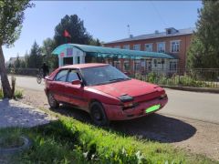 Сүрөт унаа Mazda 323