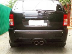 Photo of the vehicle Jeep Grand Cherokee SRT8