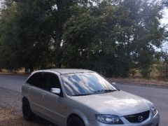 Фото авто Mazda 323