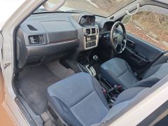 Сүрөт унаа Mitsubishi Pajero iO