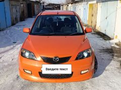 Фото авто Mazda Demio