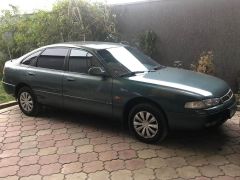 Фото авто Mazda 626