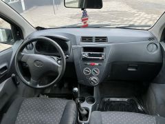 Photo of the vehicle Daihatsu Cuore