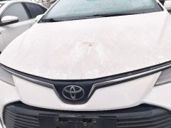 Photo of the vehicle Toyota Corolla