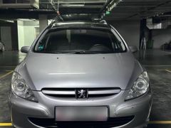 Photo of the vehicle Peugeot 307